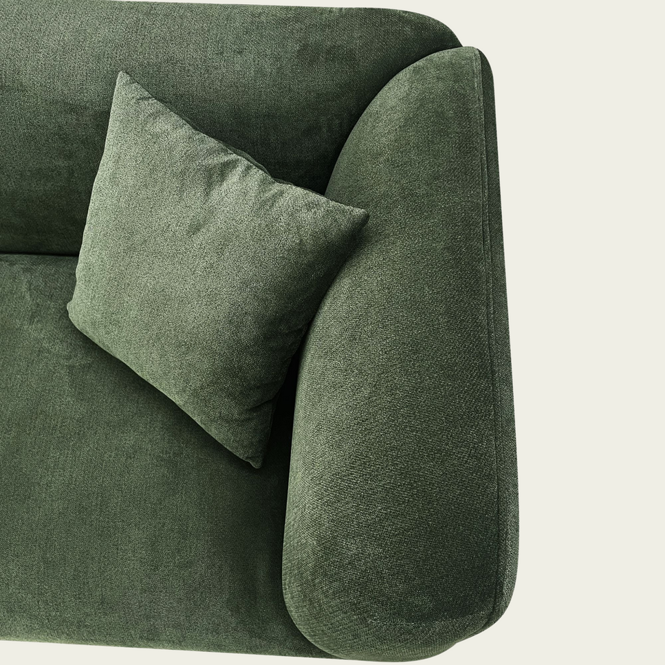 Mid century Modern angular sofa | continous arm-back | Green velvet upholstery | 2 matching pillows