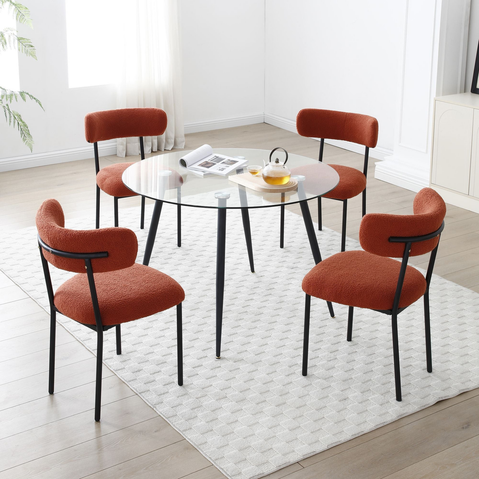 Set of 2 Mid-century modern orange sherpa chairs | curved backrest round seating & black metal legs
